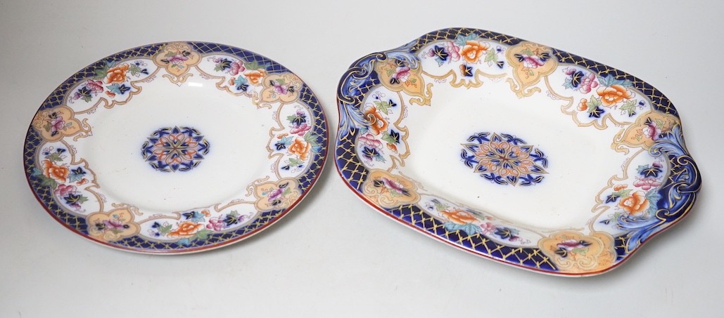 A mid 19th century English ironstone part dessert service, comprising four comports and nine plates, comports 27.5cms wide